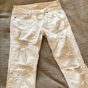 White low rise ripped skinny ankle jeans